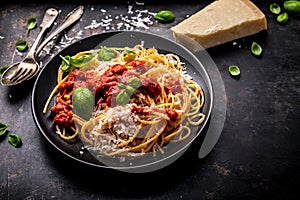 Delicious appetizing classic spaghetti pasta with tomato sauce, parmesan