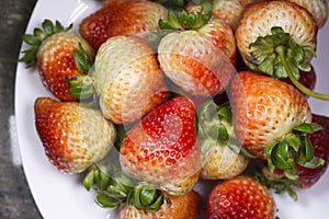 Delicious appetizing strawberry on white plate0