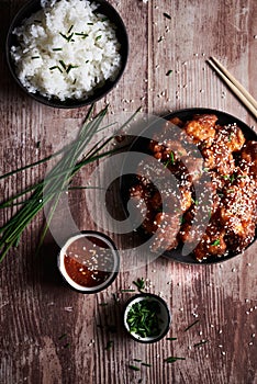 Delicious asian pices of chicken with sweet sour sauce with rice