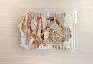 Delicious Asian style deep fried  pork with rice in take away box