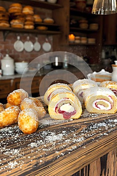 Assortment of Sweet Doughnuts and Pastry Rolls