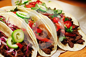 Delicious authentic snack in form of tacos mexican with vegetable and meat filling