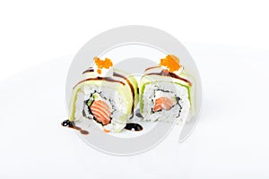 Delicious avocado sushi roll with salmon.