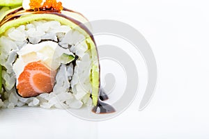 Delicious avocado sushi roll with salmon.
