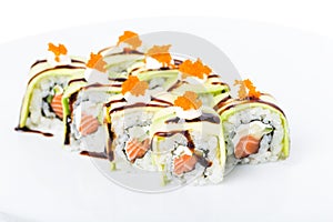 Delicious avocado sushi roll with salmon.