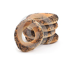 A delicious bagel with poppy seeds isolated on a white background