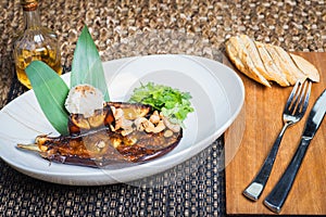 Delicious baked eggplant on a plate