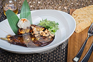 Delicious baked eggplant on a plate