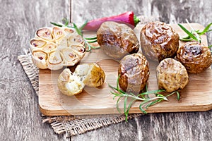 Delicious baked potato and garlic with chillie and rosemary