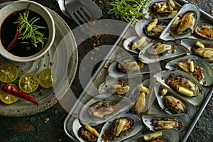 Delicious baked shellfish in a pan