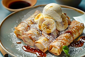 Delicious Banana and Ice Cream Crepes Sprinkled with Powdered Sugar and Drizzled with Chocolate Sauce on Ceramic Plate