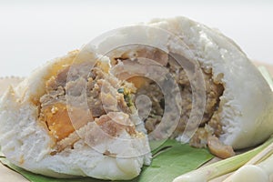 Delicious baozi, Chinese steamed pork bun on white background