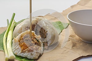 Delicious baozi, Chinese steamed pork bun on white background