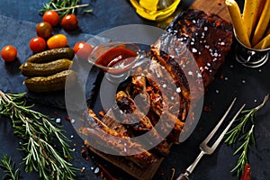 Delicious barbecued ribs seasoned with a spicy basting sauce and served with chopped