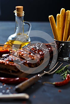 Delicious barbecued ribs seasoned with a spicy basting sauce and served with chopped