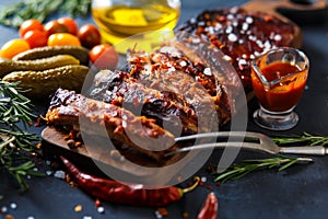 Delicious barbecued ribs seasoned with a spicy basting sauce and served with chopped