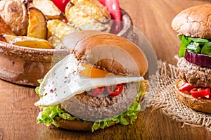 Delicious beef burger with egg