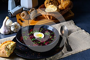 A Delicious beetroot borscht with egg