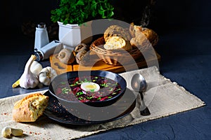 A Delicious beetroot borscht with egg