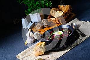 A Delicious beetroot borscht with egg