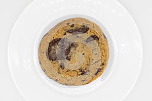 Delicious Belgian Chocolate Chip Cookie on a White Plate with a White Background