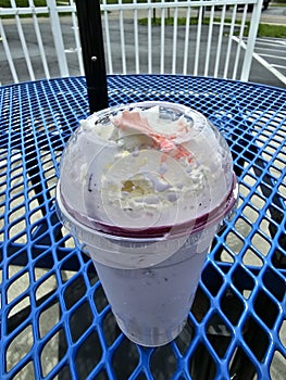 Delicious blueberry malt milkshake frozen desert