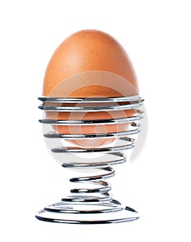 Delicious boiled brown egg in a cup