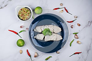 Delicious Boiled fish eat with seafood spicy dip.