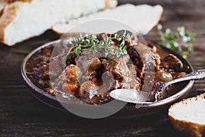 Delicious Bowl of Beef Bourguignon with Homemade Bread