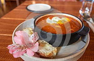 A delicious bowl of Peruvian sopa criolla and sourcream