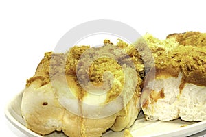 Delicious bread with flossy pork bun, freshly baked with cheese and butter, is a delicious breakfast in the bakery photo