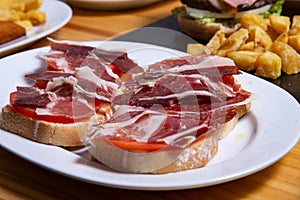 Delicious bread toast with natural tomato and ham