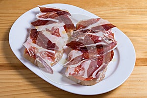 Delicious bread toast with natural tomato and ham