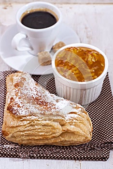 Delicious breakfast with a nice cup of coffee, fresh pastries an