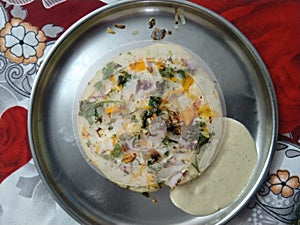 Delicious breakfast of utappam in a plate