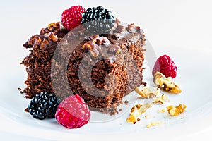 Delicious brownie with silvestre fruits closeup. photo