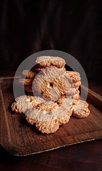 Delicious butter carroll biscuits with wooden tray