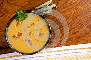 Delicious butternut squash soup with bacon bits