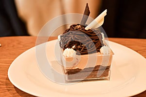 Delicious cake chocolate mousse with topping