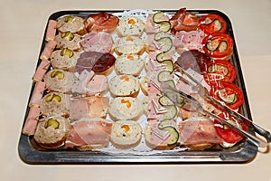 Delicious canapes for party on plate