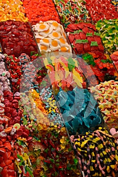Delicious Candies with different colors at Market in Barcelona, Spain.