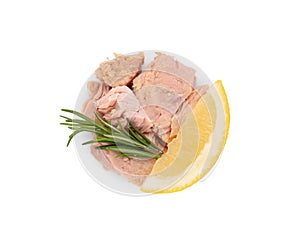 Delicious canned tuna chunks with lemon and rosemary isolated on white, top view