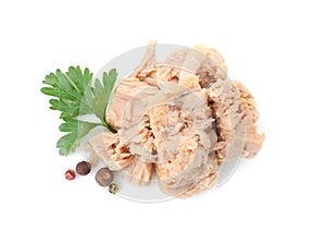 Delicious canned tuna chunks on white background