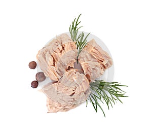Delicious canned tuna chunks on white background, top view