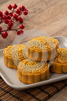 Delicious Cantonese moon cake for Mid-Autumn Festival food mooncake on wooden table background