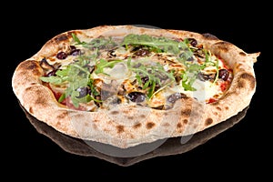 Delicious Vegetariana pizza with tomato sauce, mozzarella, mushrooms, olives, arugula and cheese with reflection photo