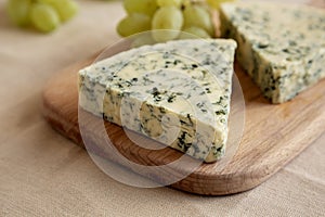 Delicious Cheese Danablu on a wooden board, side view