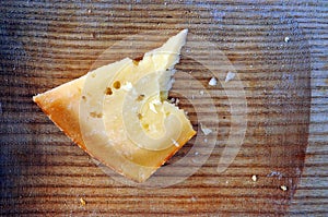 Delicious cheese Pecorino on wooden cutting board