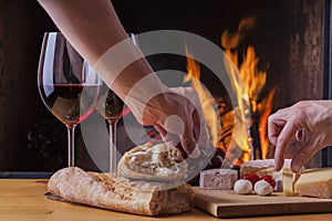 Delicious cheese and wine at the fireplace