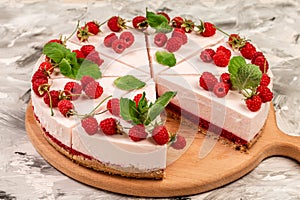 Delicious cheesecake with berries, healthy organic summer dessert pie. snack on a light background, top view